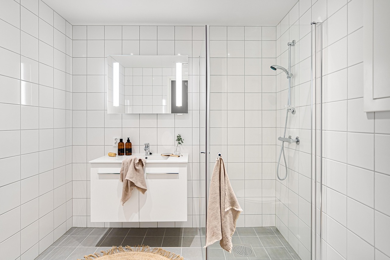 hauteur barre de douche PMR